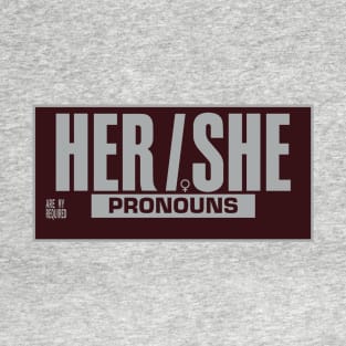 Her / She Pronouns, Yum! (brown background) T-Shirt